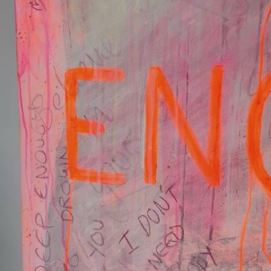 Video of the painting 'You Are Enough'. This piece has an abundance of words and sentances that overlap, bringing meaning. With the words You Are Enough at the forefront in neon orange writing under UV light